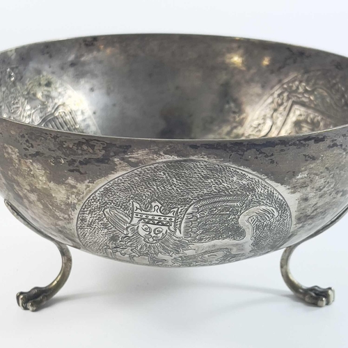 35 - A Cypriot 800 silver bowl stamped SOPHOCLIDES. The bowl embossed with three circular medallions, rai... 