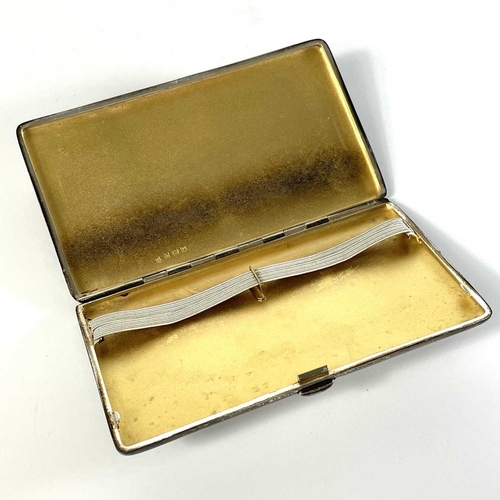 39 - A George V silver double section cigarette case. of plain rectangular form with engraved dedication ... 