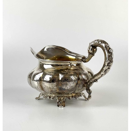 41 - An impressive William IV Irish silver three piece tea set by James Moore. Of squat lobed form with l... 