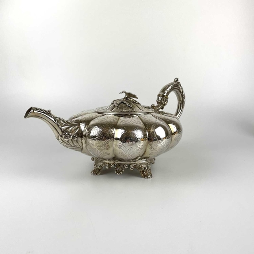 41 - An impressive William IV Irish silver three piece tea set by James Moore. Of squat lobed form with l... 