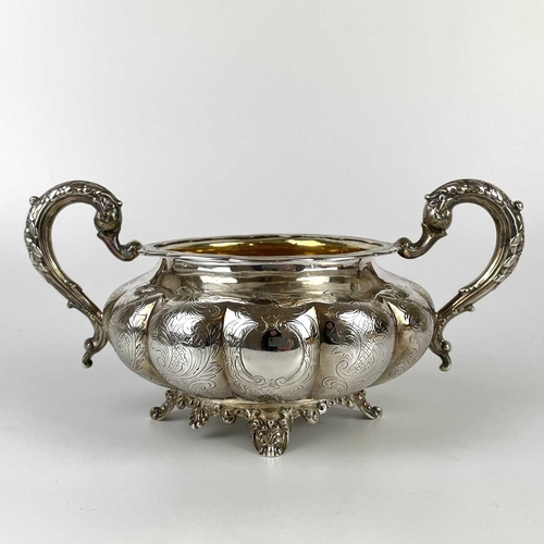 41 - An impressive William IV Irish silver three piece tea set by James Moore. Of squat lobed form with l... 