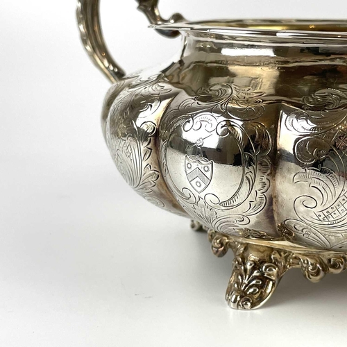 41 - An impressive William IV Irish silver three piece tea set by James Moore. Of squat lobed form with l... 