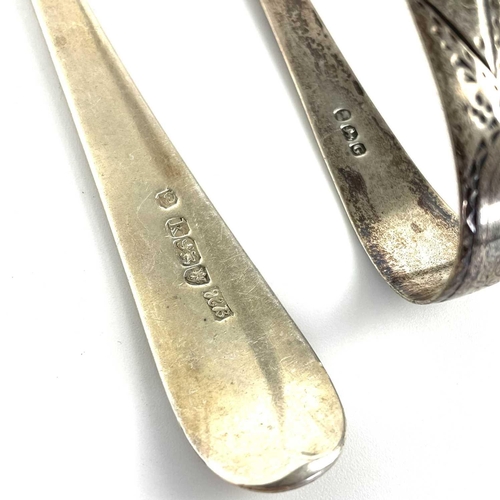 47 - A George III silver table spoon by Hester Bateman, London 1825. Together with a pair of silver tongs... 