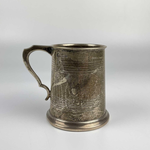 6 - A George V silver mug by William Hutton & Sons. With banded decoration, monogram and date, Birmingha... 