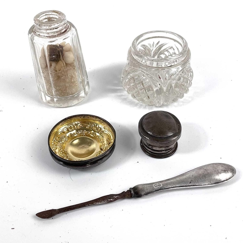 69 - A collection of hallmarked silver dressing table items. To include a hand mirror, a brush, two glass... 