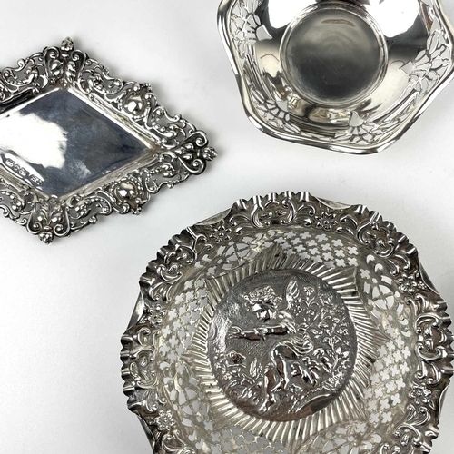 8 - A collection of nine silver hallmarked bon bon and pin dishes. Pierced and embossed decorations, 10.... 