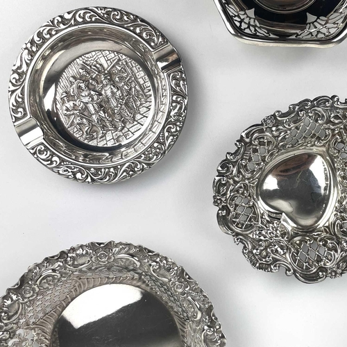 8 - A collection of nine silver hallmarked bon bon and pin dishes. Pierced and embossed decorations, 10.... 