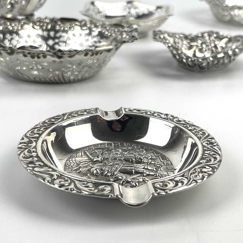 8 - A collection of nine silver hallmarked bon bon and pin dishes. Pierced and embossed decorations, 10.... 