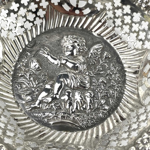 8 - A collection of nine silver hallmarked bon bon and pin dishes. Pierced and embossed decorations, 10.... 