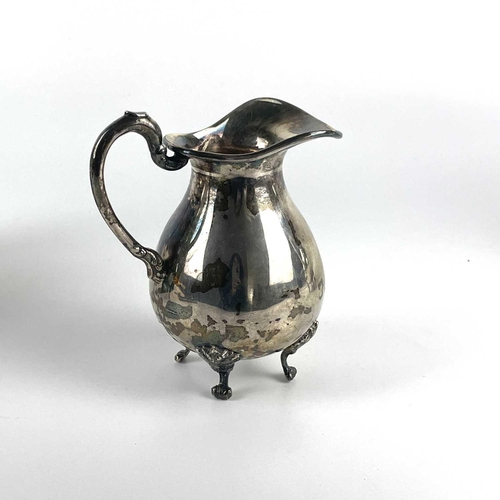 80 - A 20th century Colombian 925 sterling silver three piece coffee set. Of bellied form, the coffee and... 