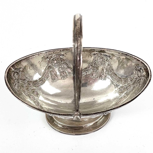 86 - A Victorian silver swing handled pedestal sugar basket by Charles Stuart Harris. Of Neo-Classical de... 