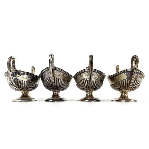 89 - A good set of four Victorian silver pedestal salts by Thomas Bradbury & Sons. Of oval half fluted fo... 