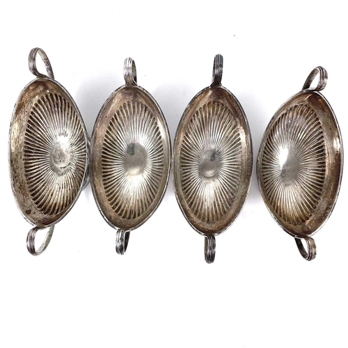 89 - A good set of four Victorian silver pedestal salts by Thomas Bradbury & Sons. Of oval half fluted fo... 