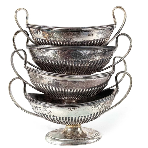 89 - A good set of four Victorian silver pedestal salts by Thomas Bradbury & Sons. Of oval half fluted fo... 