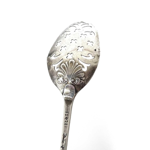 97 - A Georgian silver mote spoon. makers mark R.H, possibly for Richard Hussey, the bowl back with shell... 