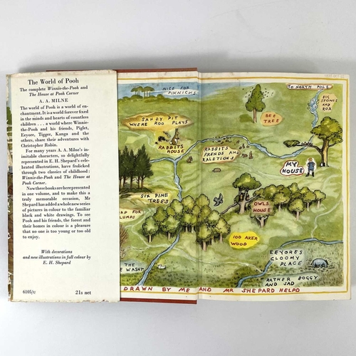 127 - A.A MILNE 'The World of Pooh' 1st edition 1958, with dj unclipped chipped and frayed, mold to cloth;... 