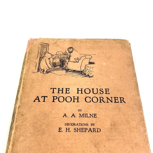 236 - A. A. MILNE. 'The House at Pooh Corner'. First edition, tears and loss to dj, original cloth with so... 