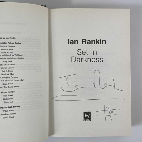 246 - Six signed Ian Rankin's and one signed Elizabeth Peters. IAN RANKIN. 'Dead Souls' (1999), 'Exit Musi... 