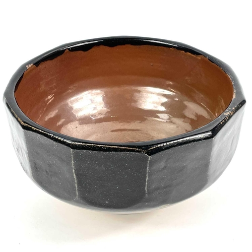 461 - Bernard Howell LEACH (1887-1979) A stoneware cut sided bowl with Tenmoku glaze. Impressed with perso... 