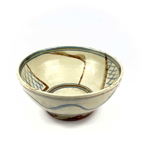 472 - Michael CARDEW (1901-1983) A large footed stoneware bowl. Impressed personal and Wenford Pottery sea... 