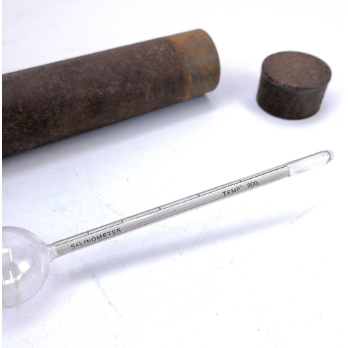 108 - A blown glass salinometer in a metal cylinder case. Length 23cm.