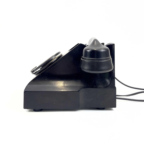 112 - An AEP black Bakelite telephone. Dated 1957, length 19cm.