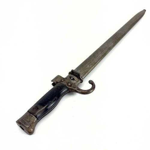 115 - A WWI bayonet and scabbard. With a 40cm straight single fullered blade, downturned quillon, numbered... 