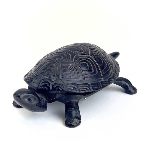 116 - A 20th century German made cast iron counter bell in the form of a tortoise. Length 18cm.