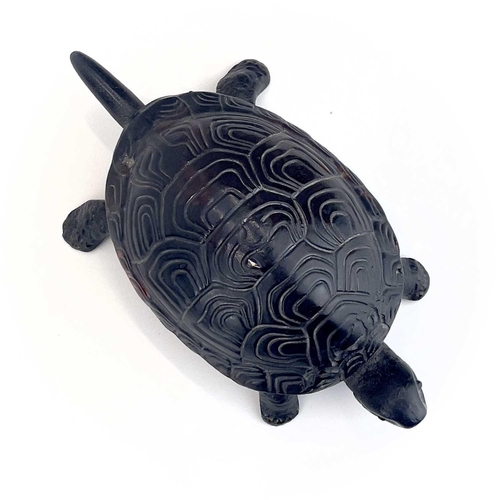 116 - A 20th century German made cast iron counter bell in the form of a tortoise. Length 18cm.