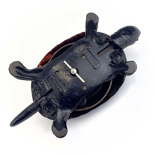 116 - A 20th century German made cast iron counter bell in the form of a tortoise. Length 18cm.