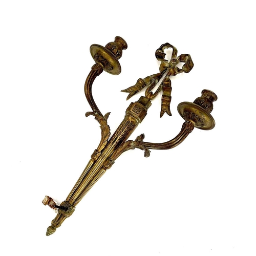 123 - A pair of bronze twin branch candle sconces. French, late 19th century, of Neo-classical design, wit... 