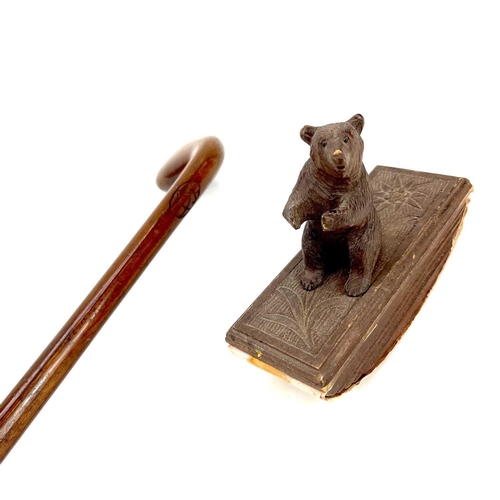 134 - A Black Forest carved blotter surmounted by a seated bear. Height 10cm. Together with a late19th/ear... 