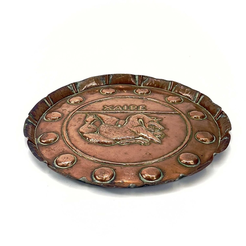 136 - An Arts and Crafts Hayle copper tray of circular form, Diameter 28.25cm, another copper tray embosse... 