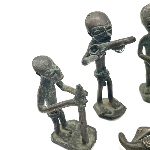 138 - Eight Ashanti bronze small figures. Late 19th/early 20th century, the largest height 6cm, together w... 