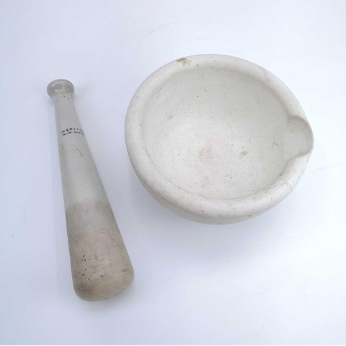 140 - A mortar and pestle of large proportions. The pestle stamped 'MERITOR MAW BARNET'. Length of pestle ... 