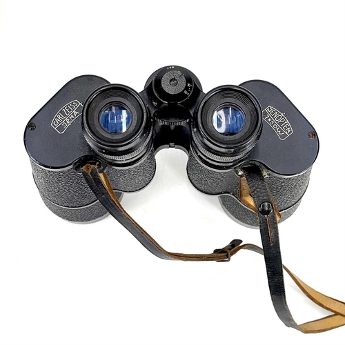 141 - A pair of Carl Zeiss Jena Jenoptem 7 x 50 W binoculars. With brown leather case.