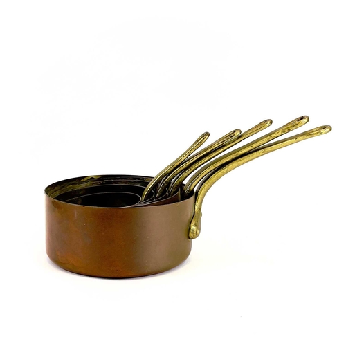 142 - A graduated set of five copper pans. Diameter of largest pan 20cm.