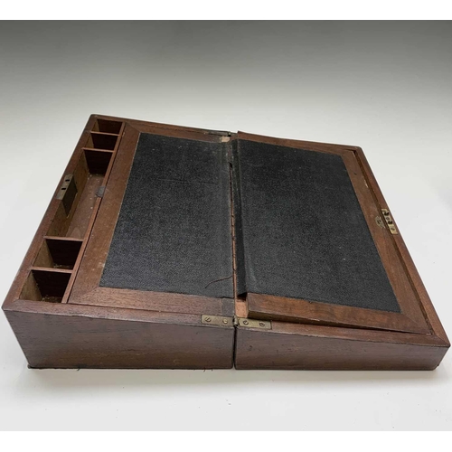 144 - A Victorian mahogany and brass bound writing slope. With key, height 17cm, width 45cm, depth 25cm, a... 