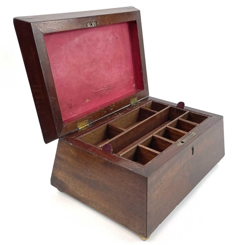 145 - A Victorian mahogany work box of sarcophagus form. With removable interior tray, raised on bun feet.... 