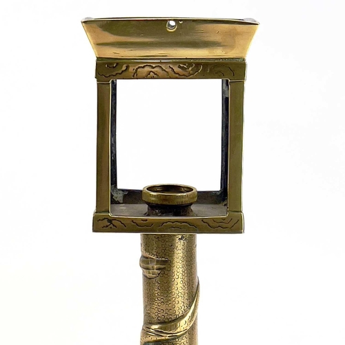 153 - A Japanese brass lantern type table lamp. Cast with dragons and birds, height 44cm.