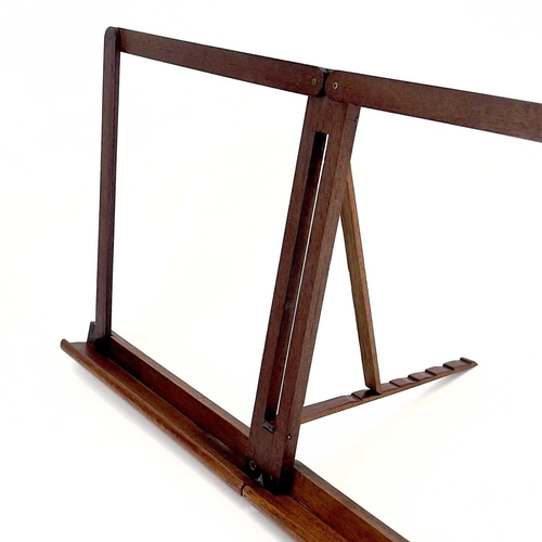 156 - A mahogany folding music stand. Height 28cm, width 54cm.