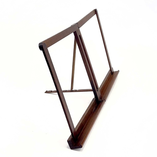 156 - A mahogany folding music stand. Height 28cm, width 54cm.