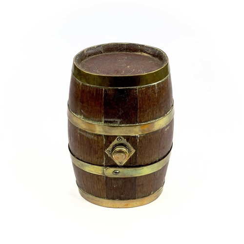 157 - A late 19th/early 20th century oak and brass bound Devon 'Costrel' or cider barrel. Height 26cm.