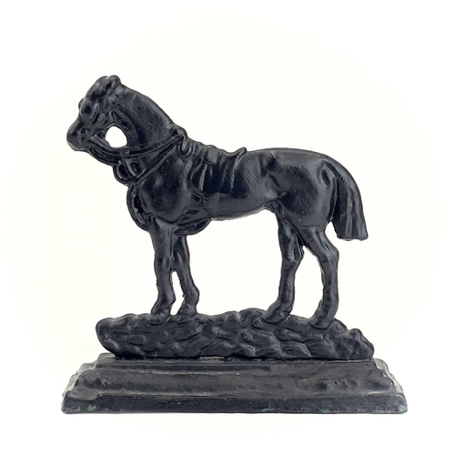 16 - A Victorian cast iron doorstop of a horse. Width 23.5cm, together with another of Mr. Punch, height ... 