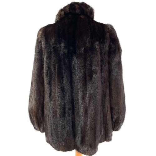 1606 - A Grosvenor Canada (exclusive to Harrods) mink half-length fur jacket. Together with a matching hat ... 