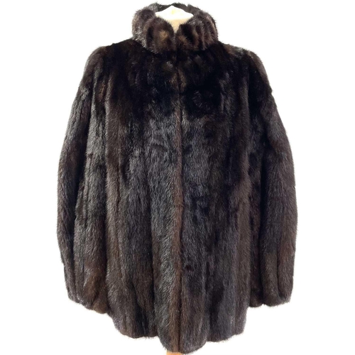 1606 - A Grosvenor Canada (exclusive to Harrods) mink half-length fur jacket. Together with a matching hat ... 