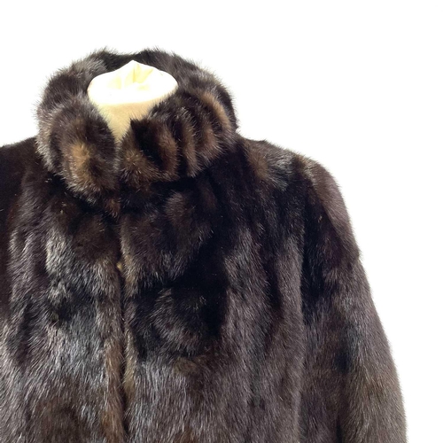 1606 - A Grosvenor Canada (exclusive to Harrods) mink half-length fur jacket. Together with a matching hat ... 