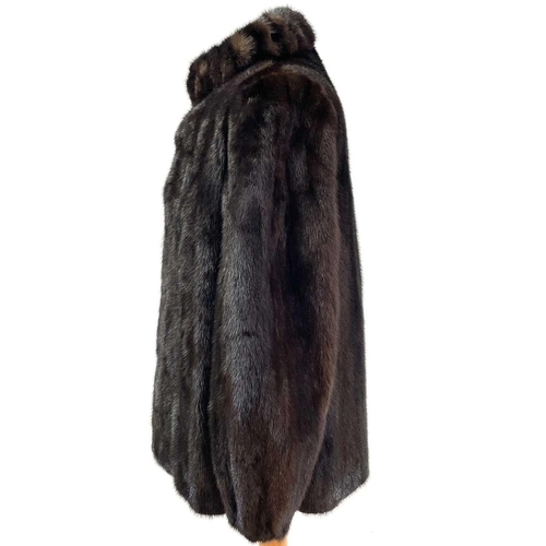 1606 - A Grosvenor Canada (exclusive to Harrods) mink half-length fur jacket. Together with a matching hat ... 