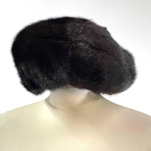 1606 - A Grosvenor Canada (exclusive to Harrods) mink half-length fur jacket. Together with a matching hat ... 