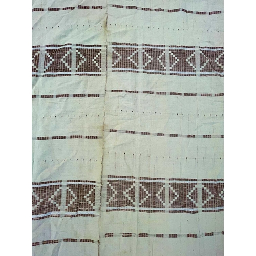 1611 - A cotton African textile with geometric designs. 135cm x 230cm, together with two other African text... 